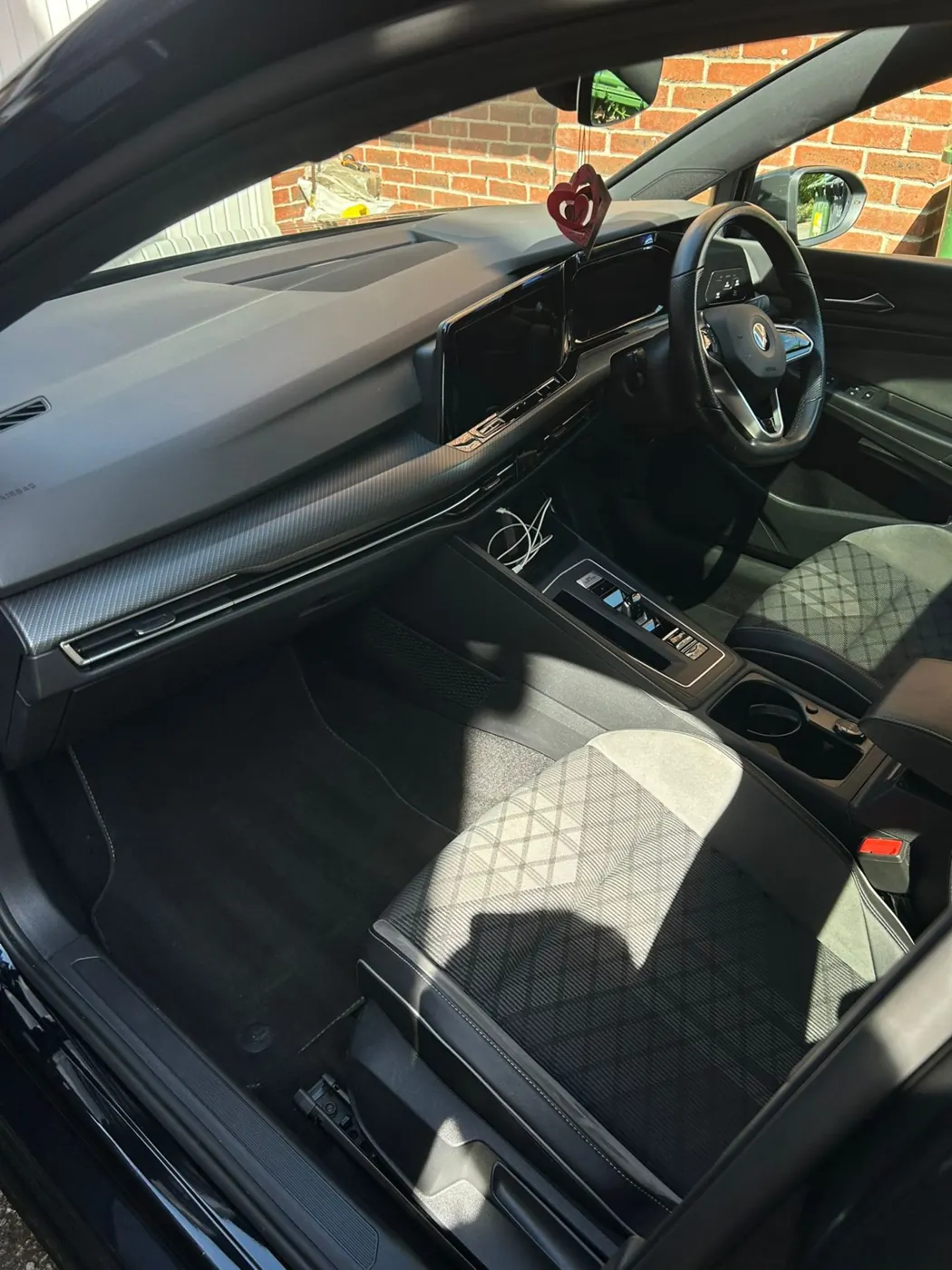 Clean dashboard, steering wheel and front seats after an interior wipe down