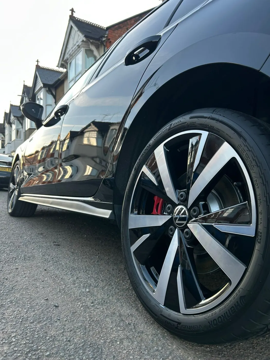 Cleaned and dressed alloy wheel and tyre after an exterior wash